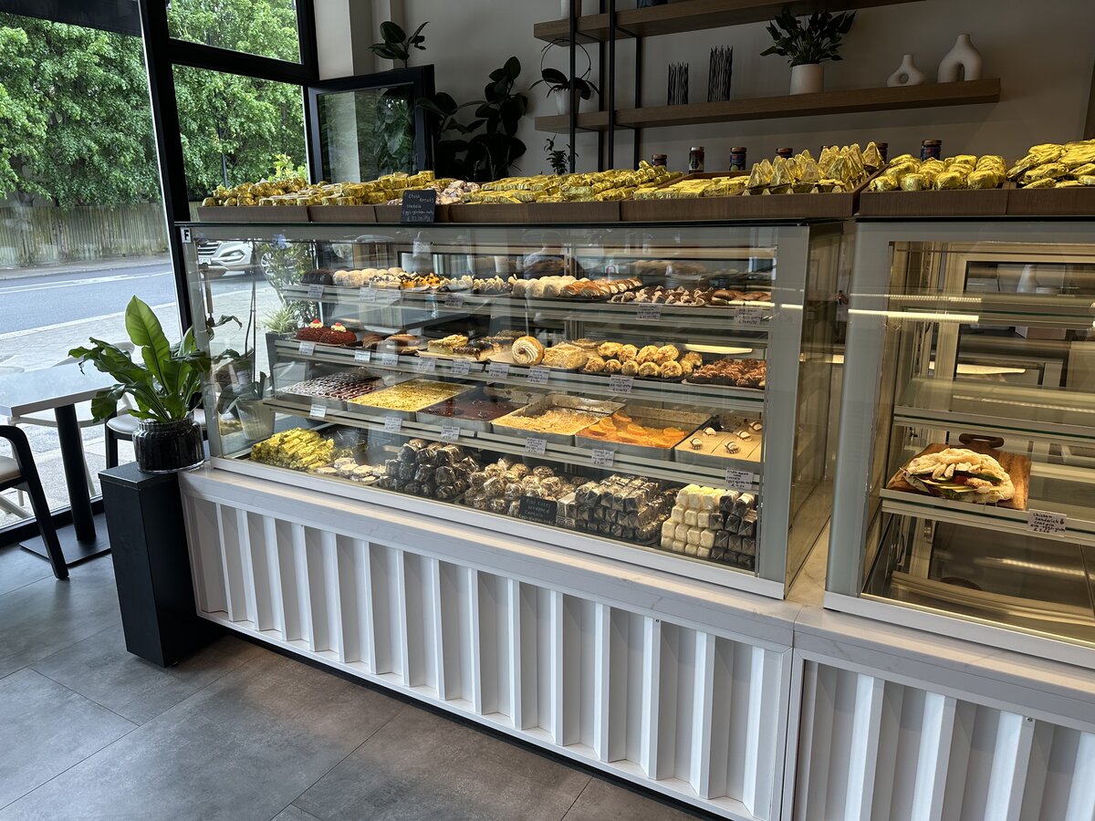 Cakes and pastries display at Ella's Bakery